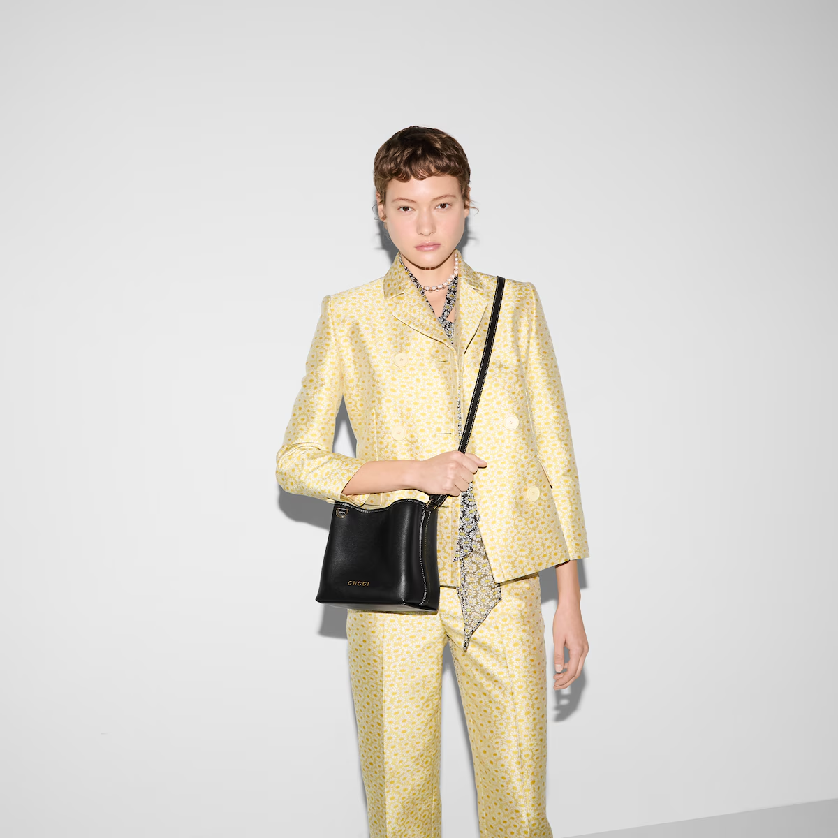 GG EMBLEM MINI BUCKET BAG