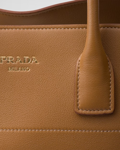 Large leather tote bag with buckles