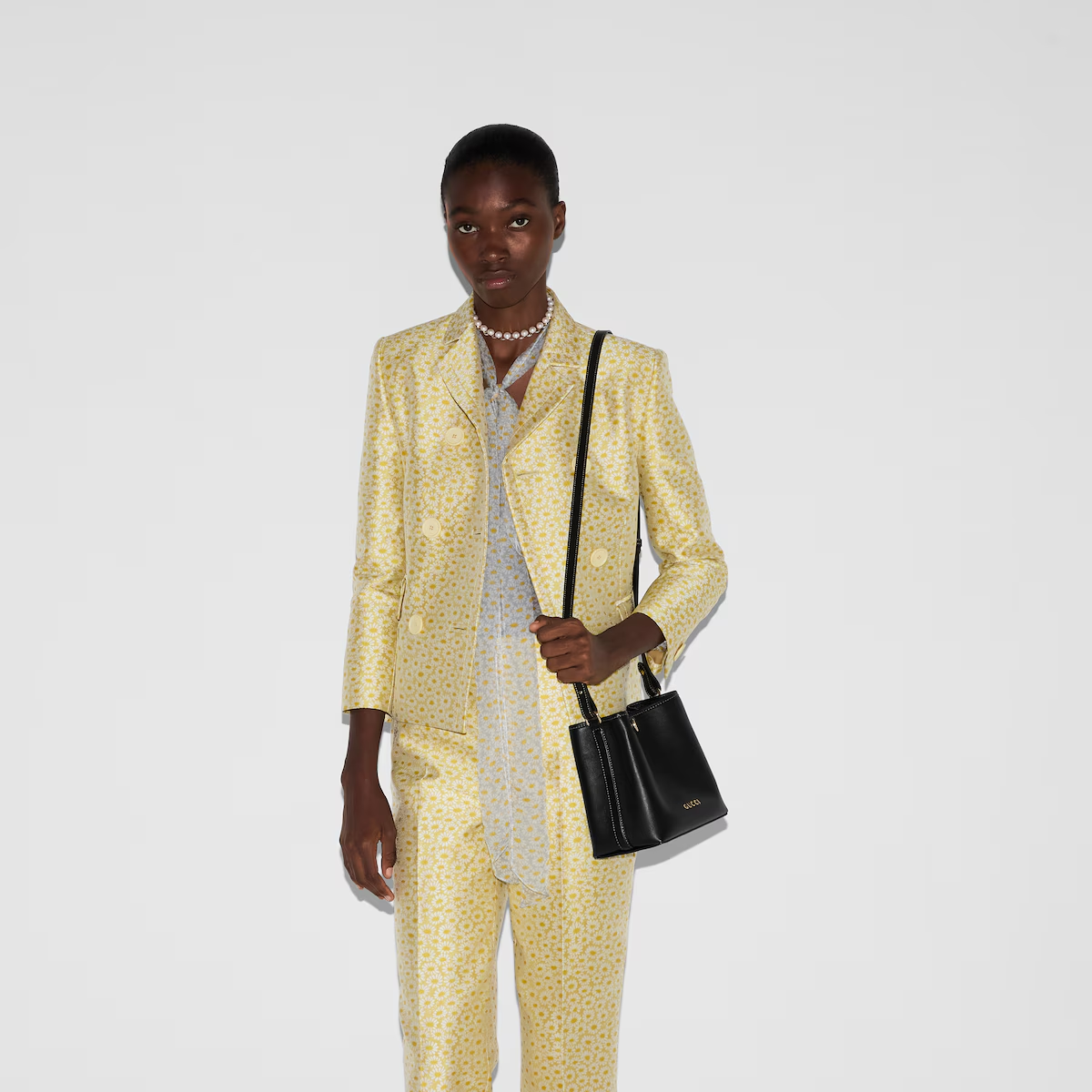 GG EMBLEM MINI BUCKET BAG