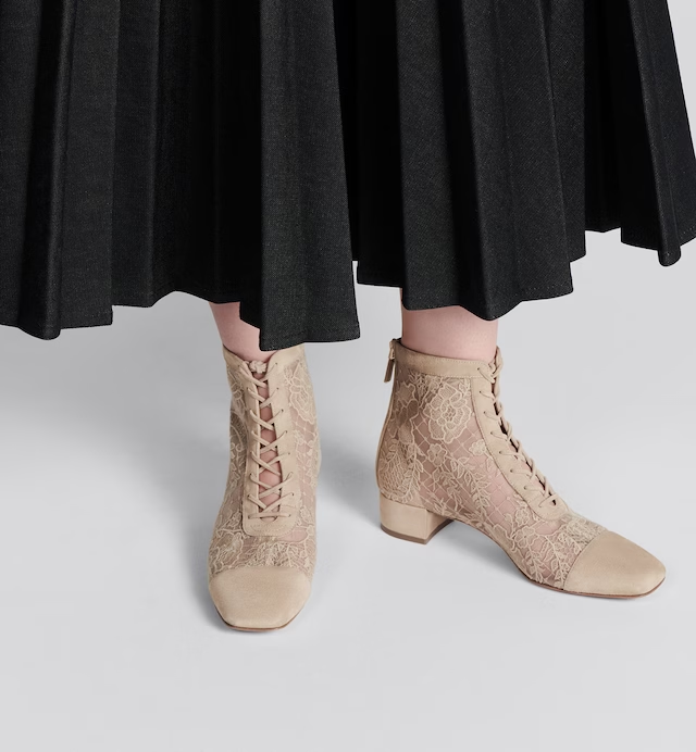 NAUGHTILY-D HEELED ANKLE BOOT