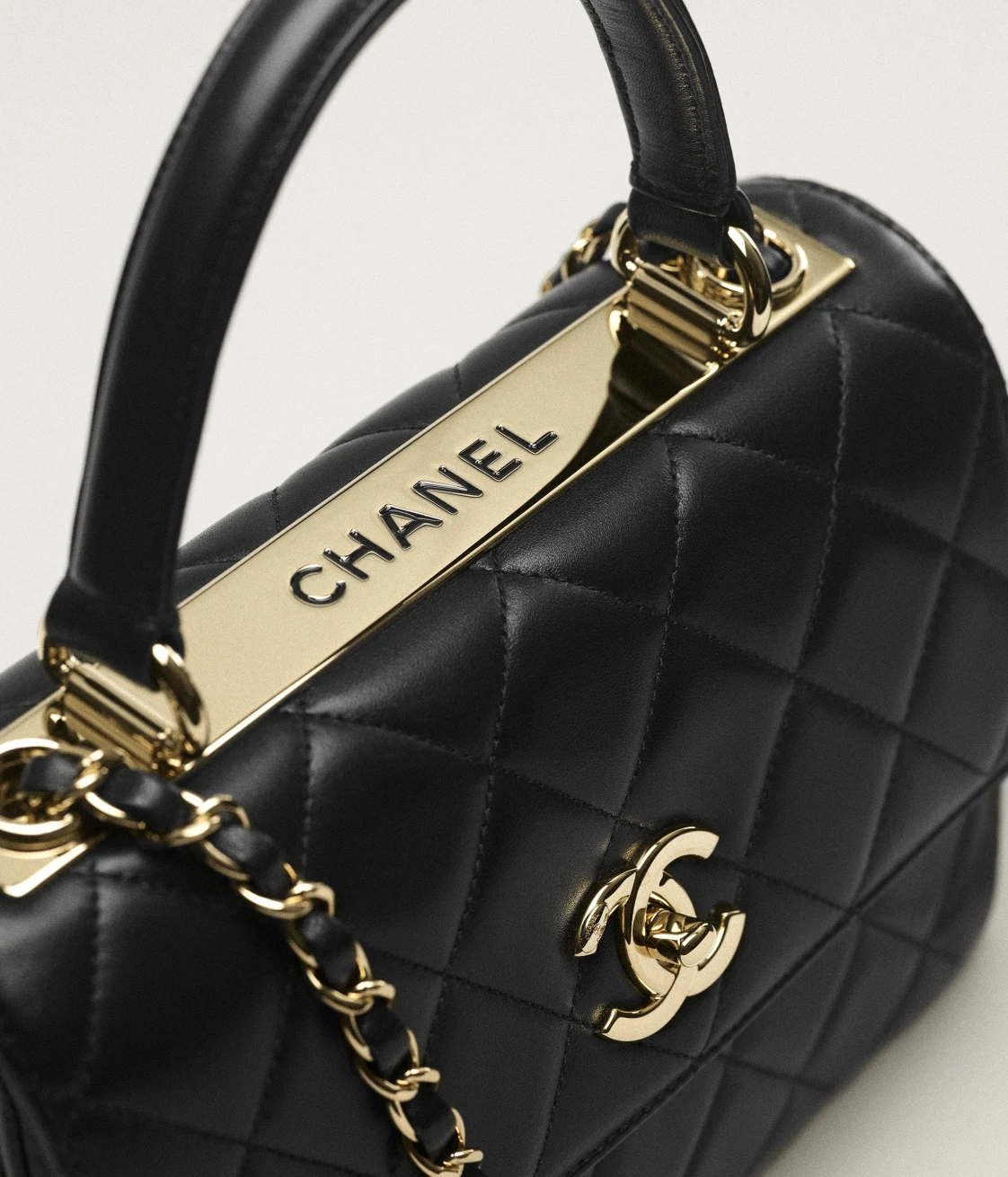 FLAP BAG WITH TOP HANDLE