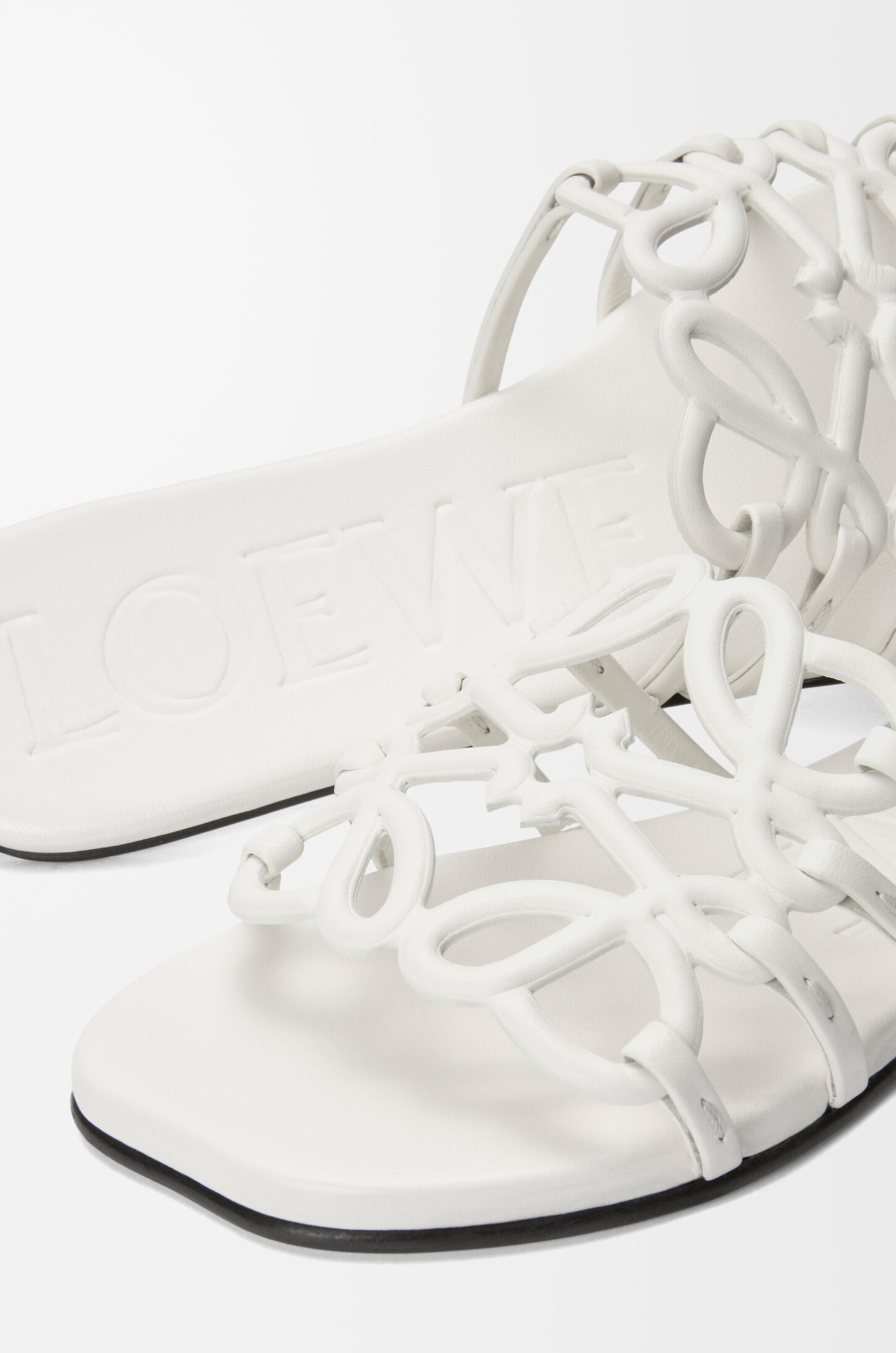Petal Anagram slide in calfskin