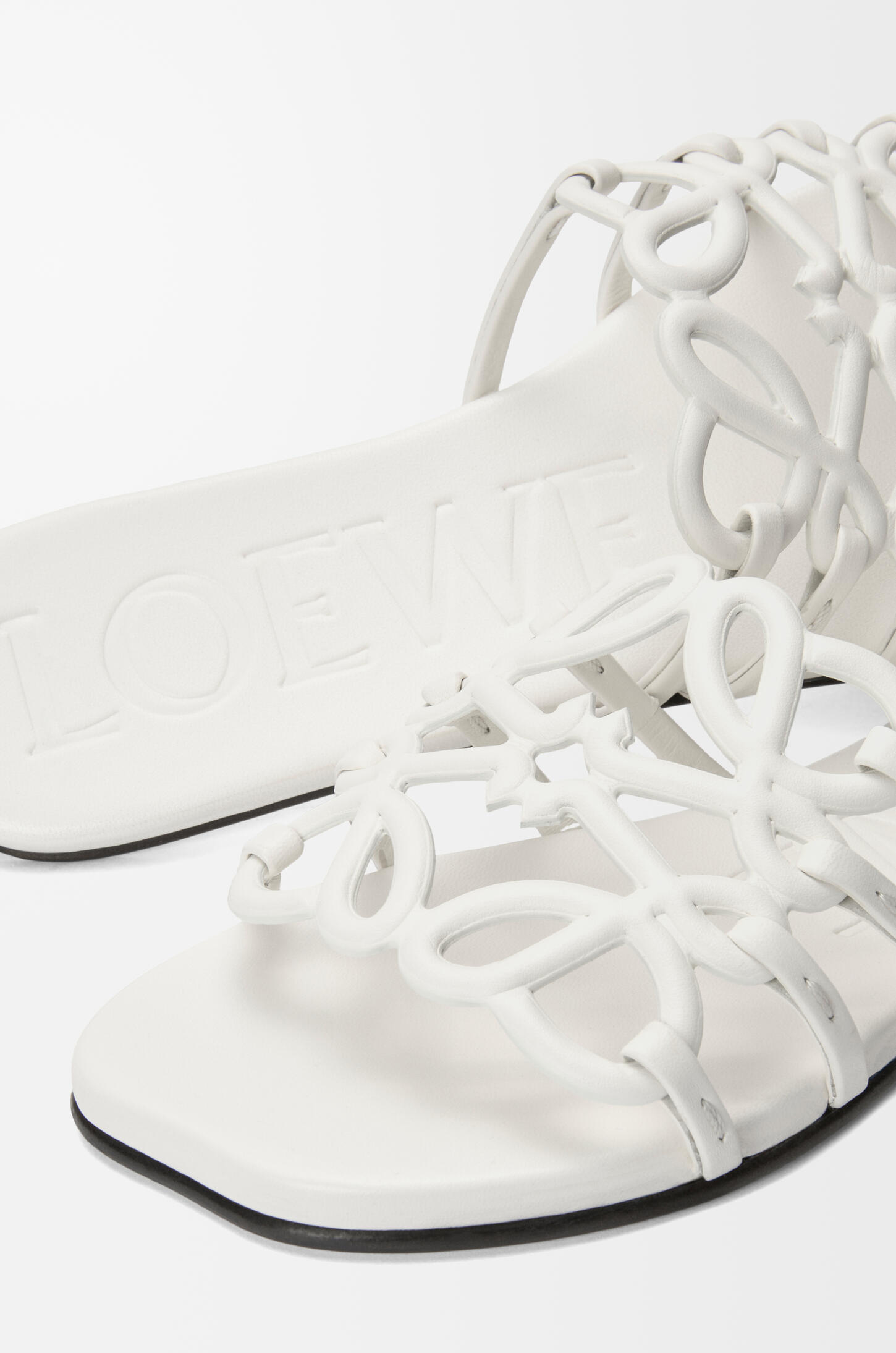Petal Anagram slide in calfskin