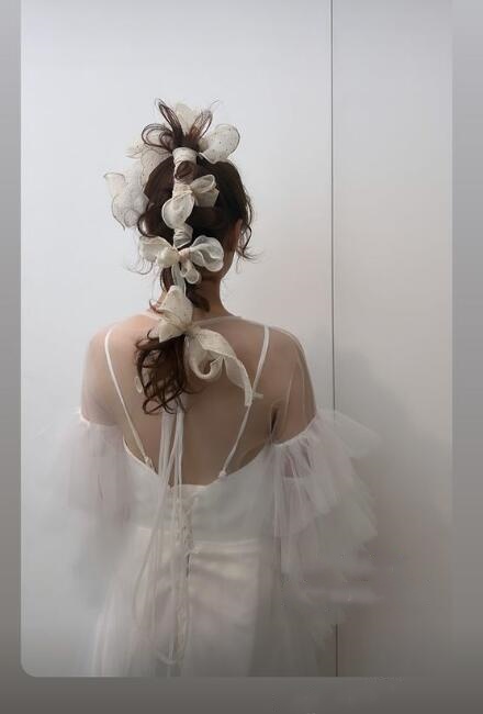 実例写真！抜群のおしゃれ見えカーディガン(トップス) 　ソフトチュール　 ラッフルフリル 　長袖ボレロ 　結婚式/前撮り