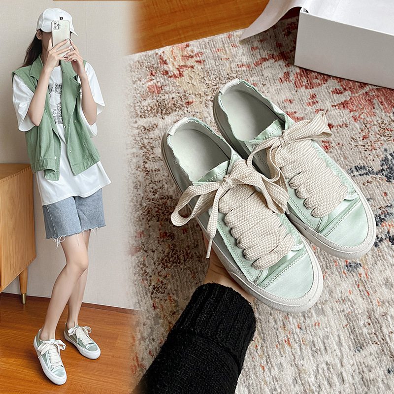 西班牙小眾薄款綢緞小白鞋帆布平底鞋