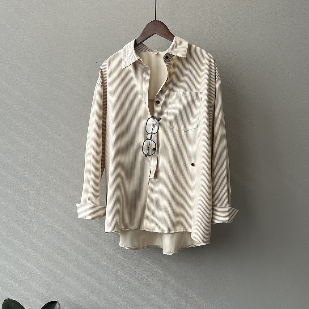 新款設計感不規則斜扣襯衫寬鬆上衣