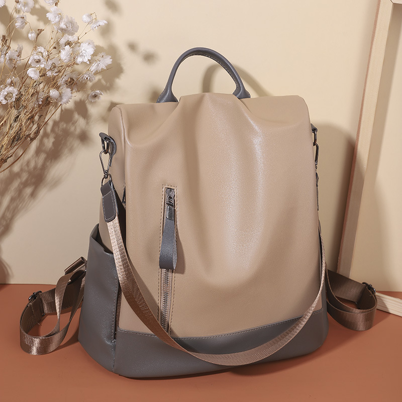 PU軟皮質感雙肩包時尚大容量防盜旅行包