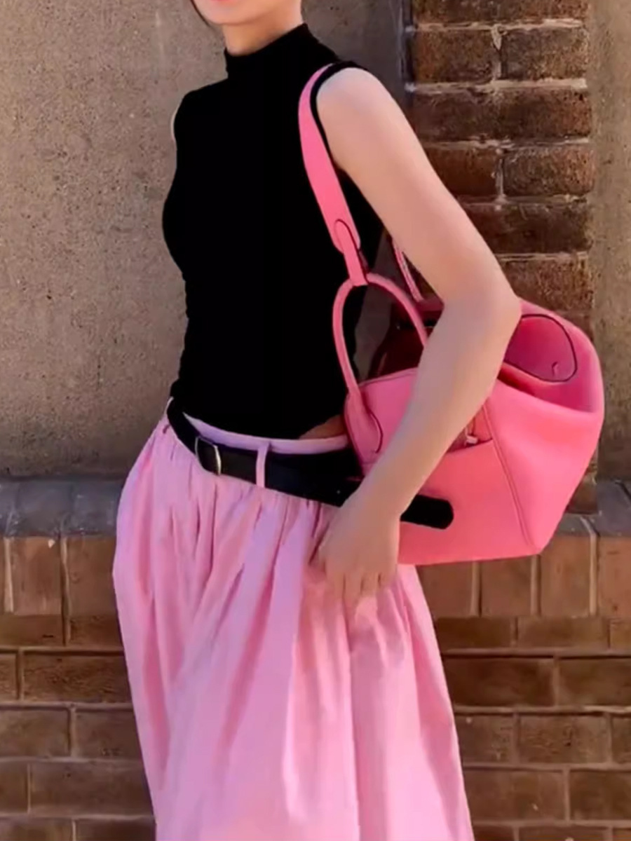 時尚無袖T卹上衣+高級感粉紅色半身裙兩件套