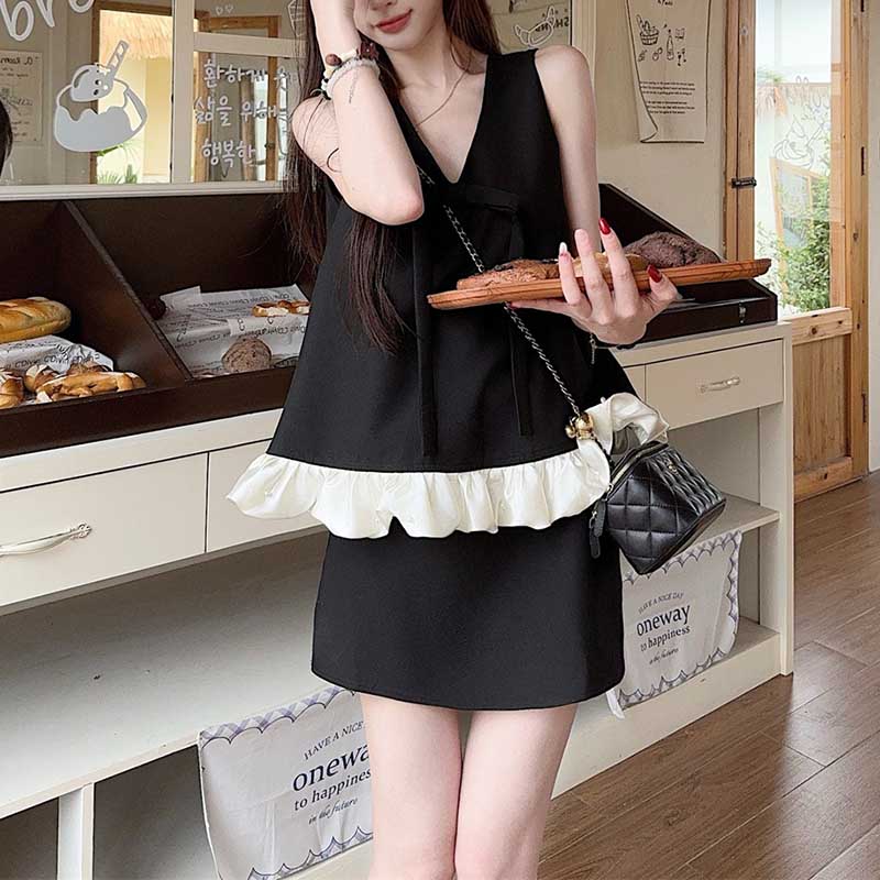 精緻名媛風蝴蝶結V領西裝上衣+短裙套裝