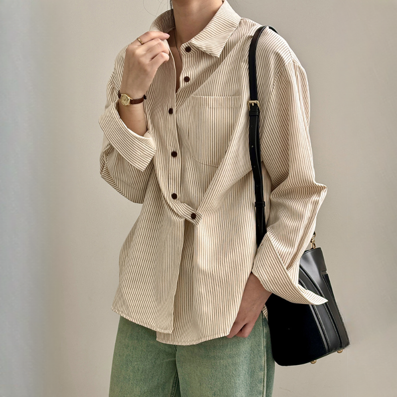 新款設計感不規則斜扣襯衫寬鬆上衣