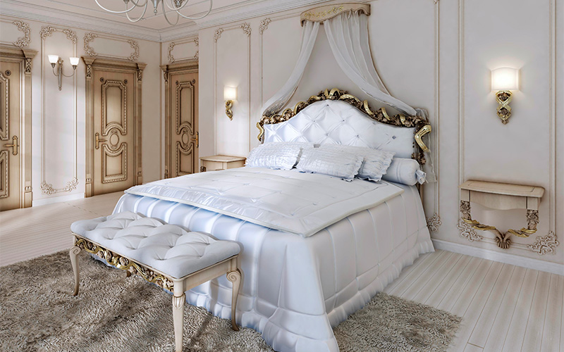 Luxurious king size bed frame in a classic Singapore bedroom.