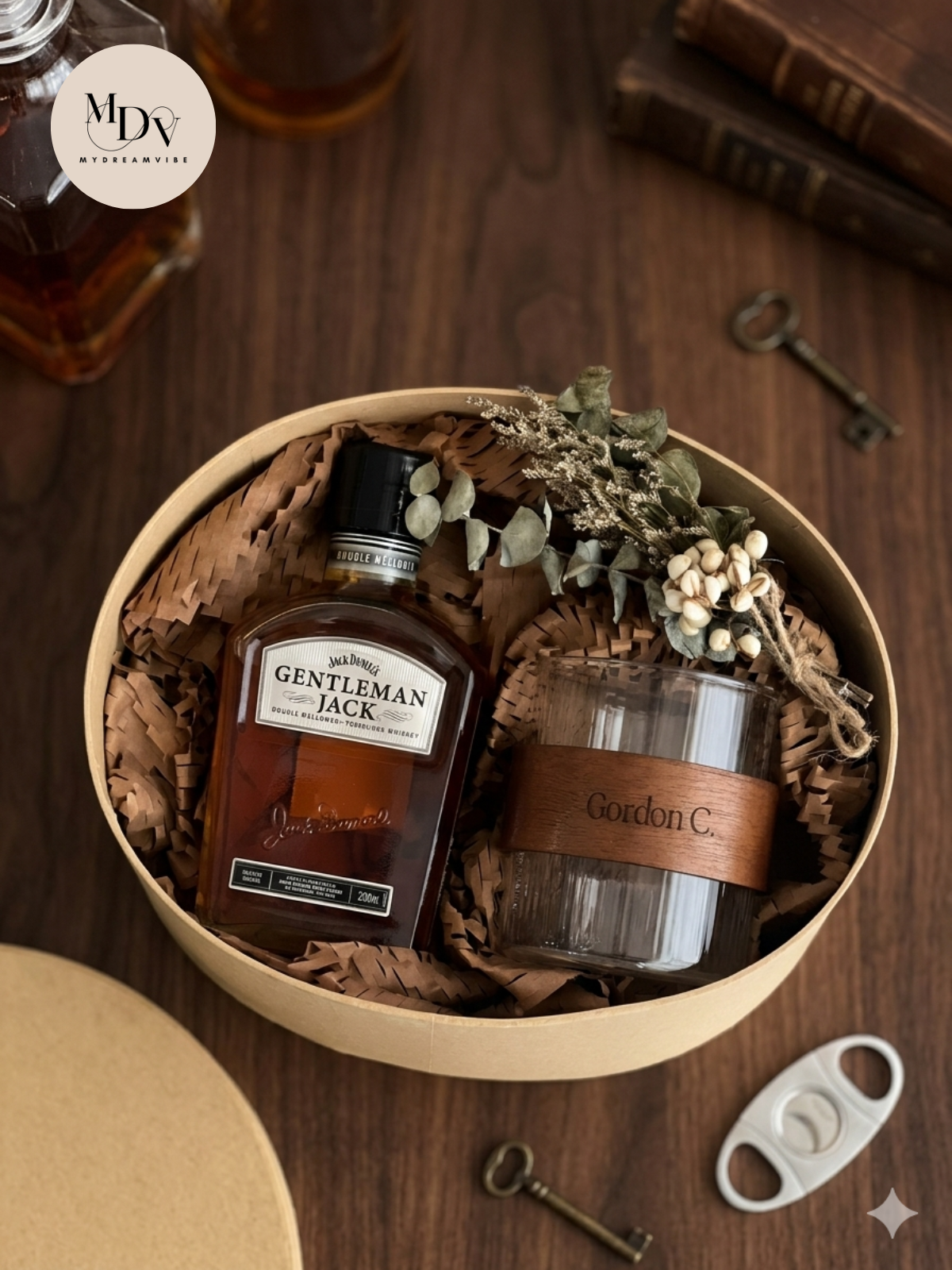Personalised whiskey gift box featuring Gentleman Jack 200ml, a weighted glass tumbler, and a custom name-engraved
