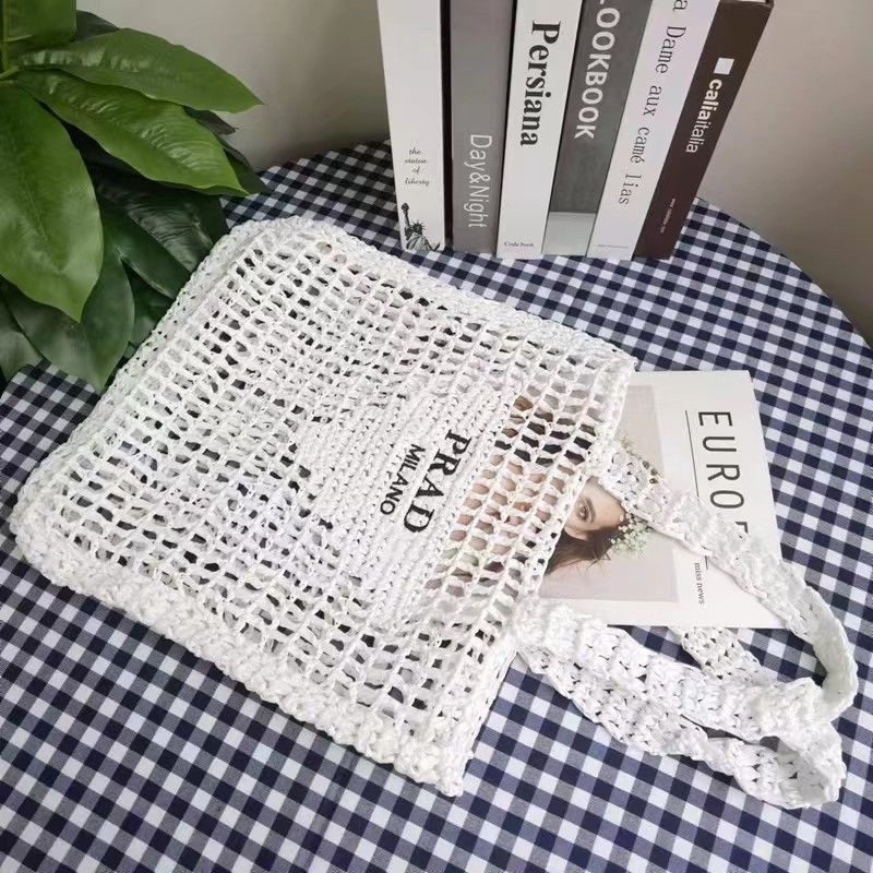 【2024】PRAD/A夏のくり抜きラフィアトルテバッグ、海辺の休日ストローバッグ【50%OFF送料無料】