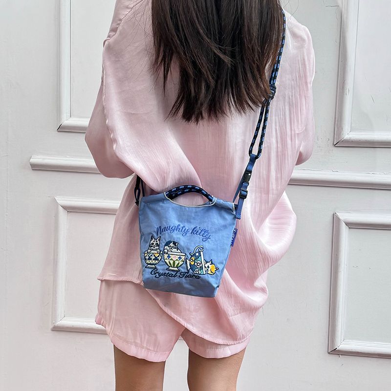 25款日系mini款休閒設計感刺繡環保尼龍手提斜挎包-Cicimode