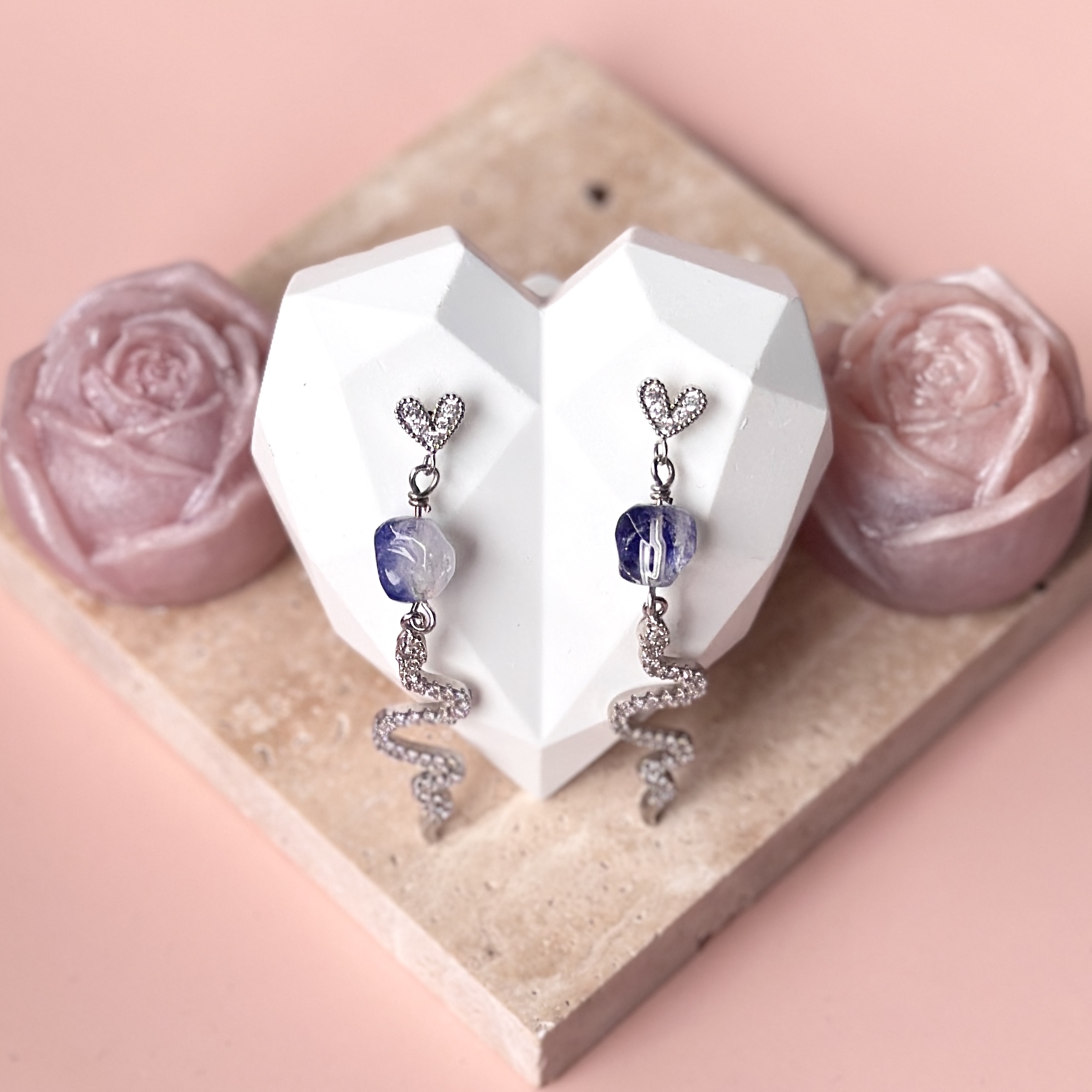 Faceted Dumotierite with Snake