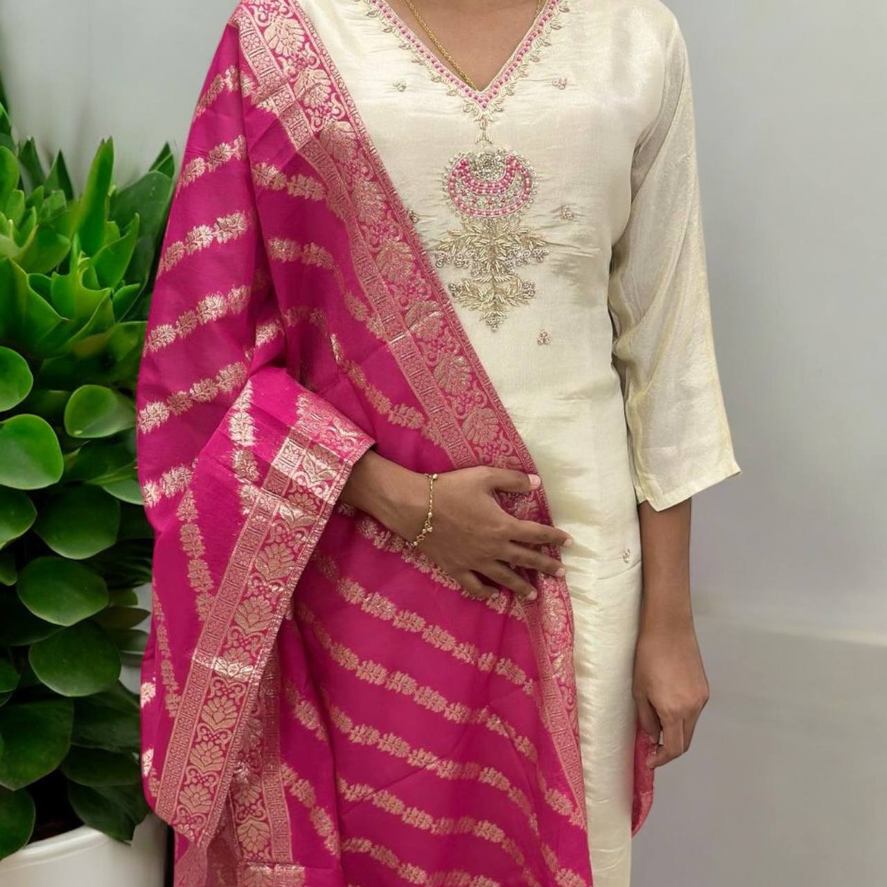 Gold Shimmer Designer Suit with Pink Dupatta