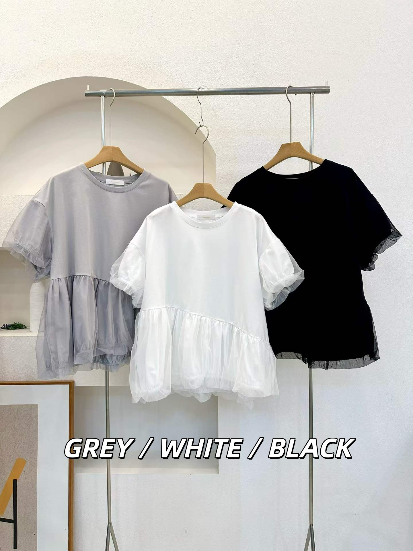 EMBERLY SLANTED MESH PEPLUM TOP