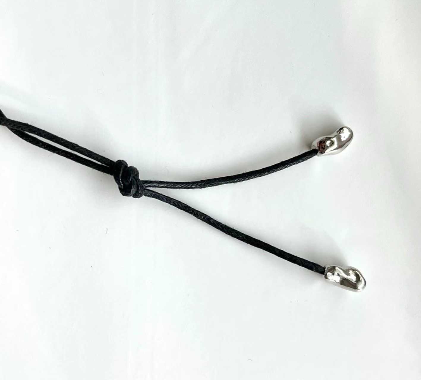 FRANCINNE IRREGULAR DONUT PENDANT STRING NECKLACE