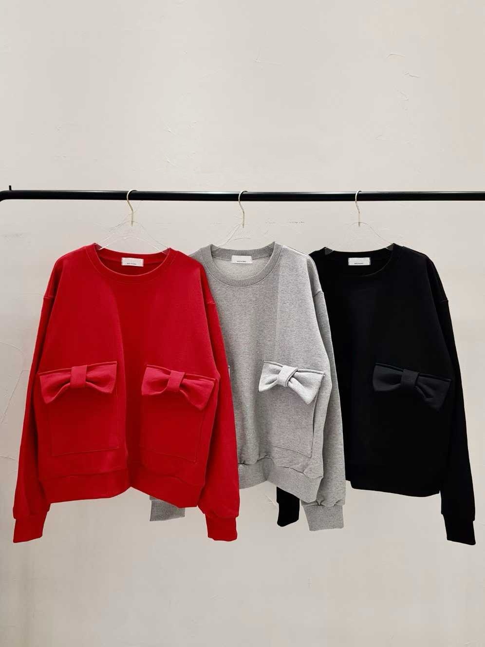 DAISY BOW POCKET SWEATSHIRT