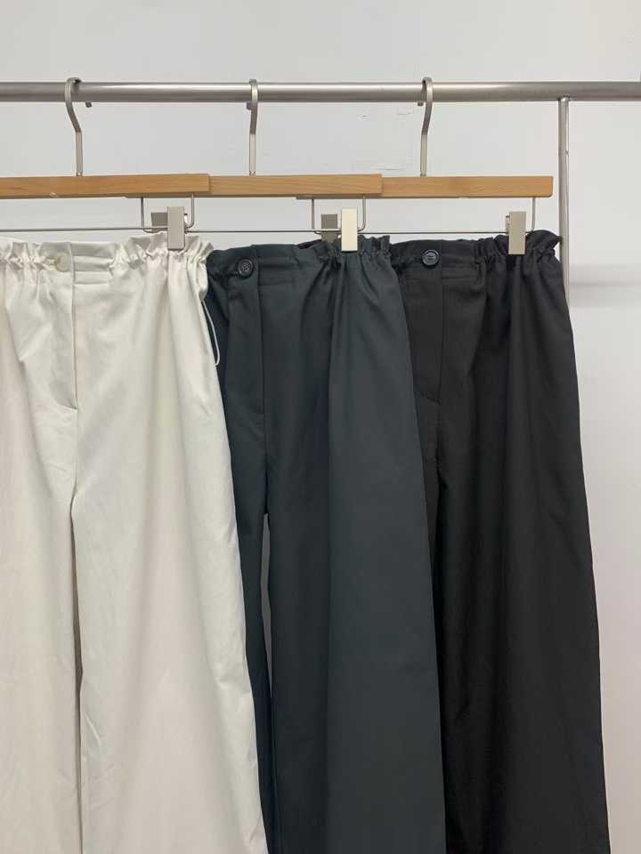 ELLA TOGGLE WAIST BAGGY TROUSERS