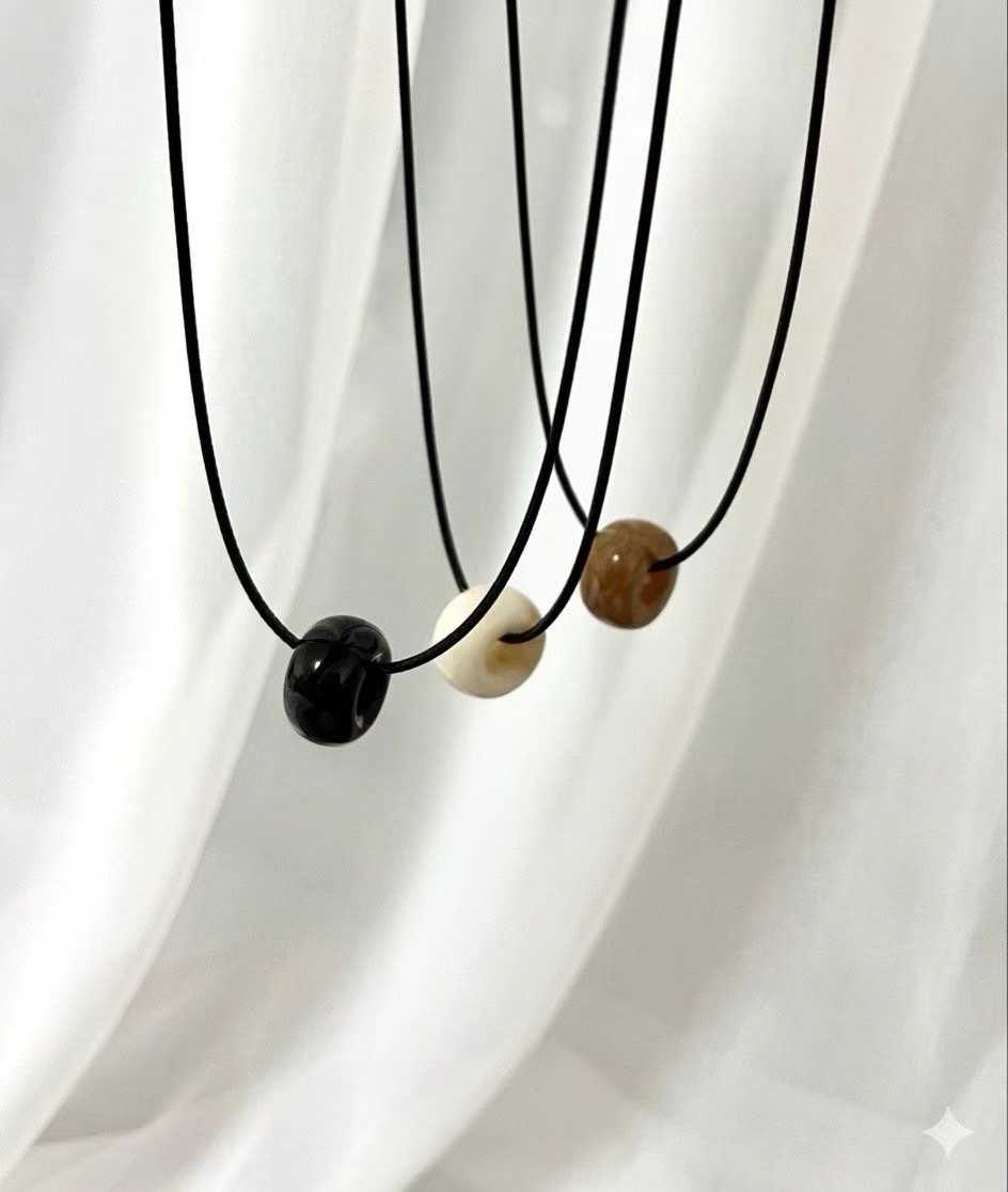 FLOSSY RING PENDANT STRING NECKLACE