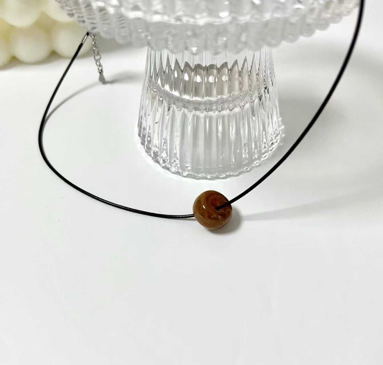 FLOSSY RING PENDANT STRING NECKLACE