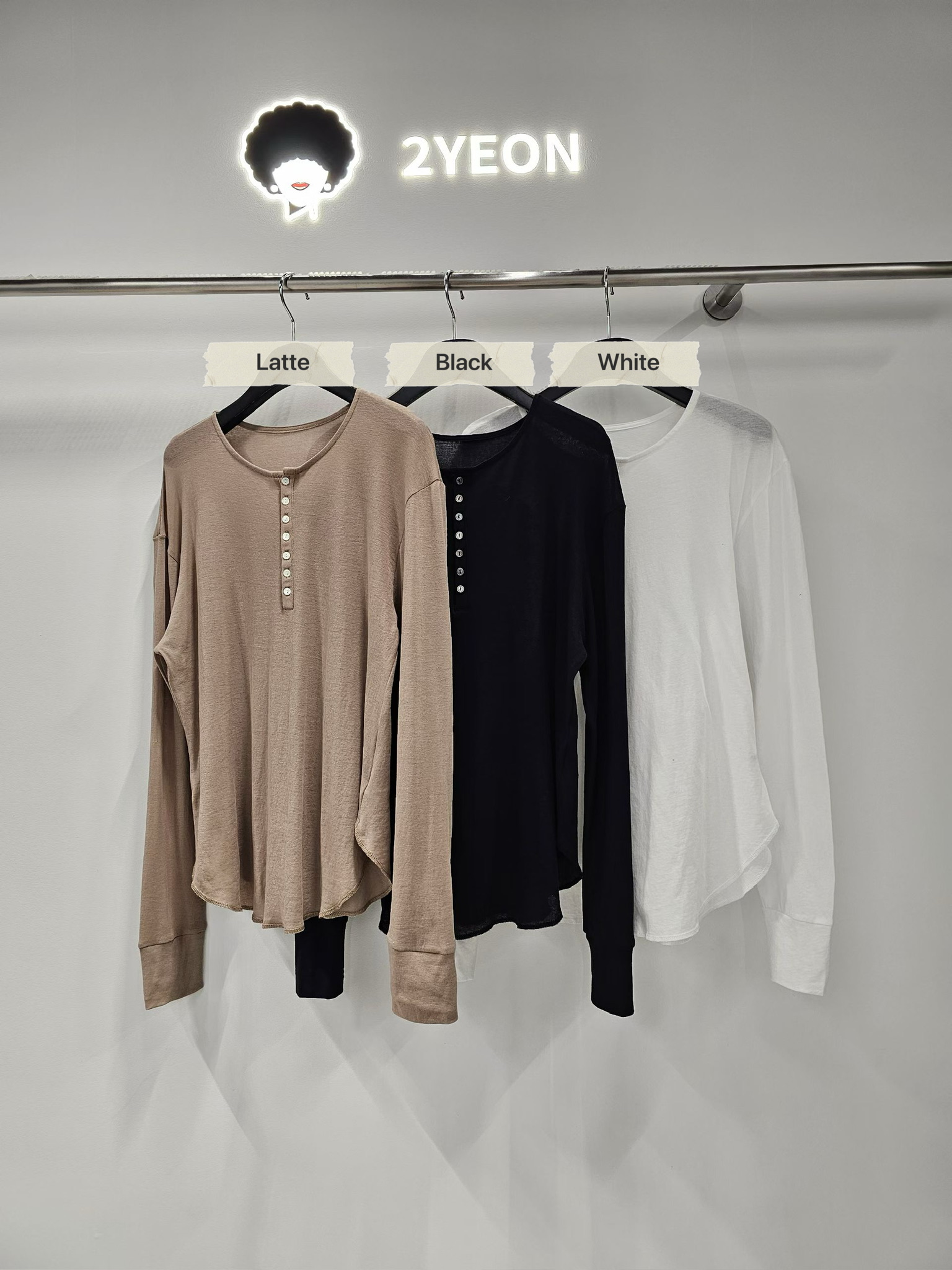 NY09 / Henley Collar Long Sleeve Top
