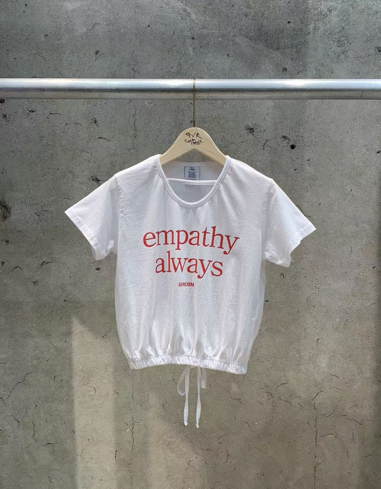 GM27/EMPATHY ALWAYS OPEN BACK TEE 