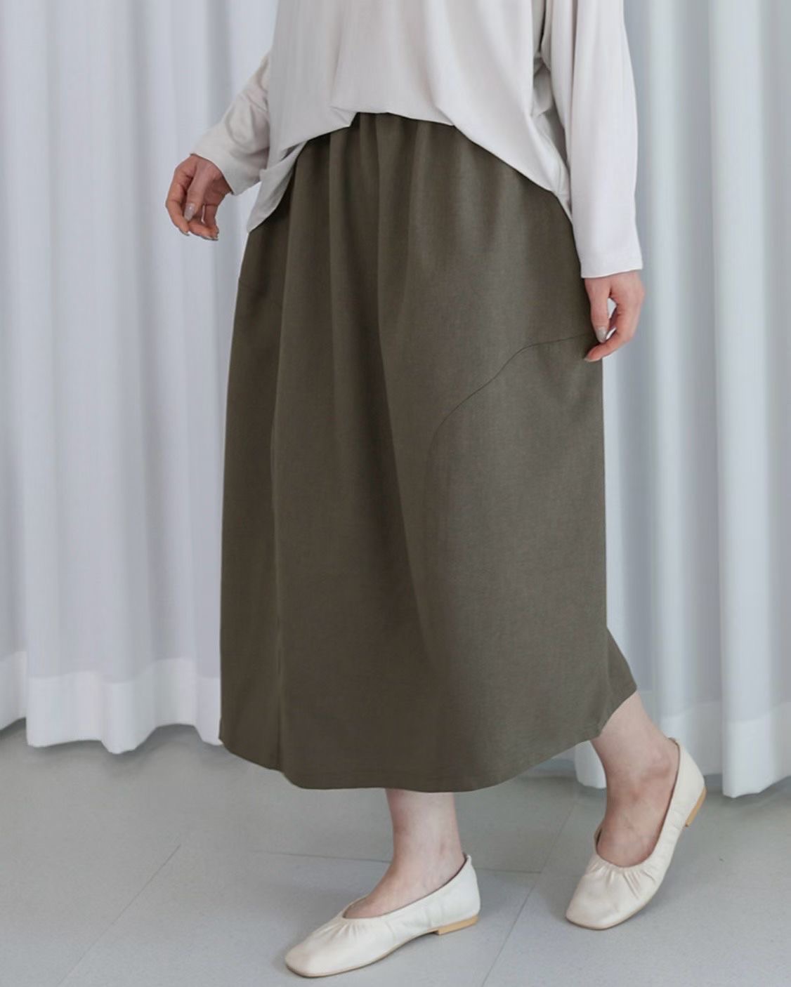 JY21 / BANDED WAIST ASYMMETRICAL POCKET SKIRT