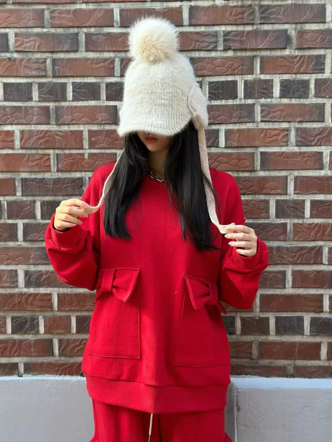 DAISY BOW POCKET SWEATSHIRT