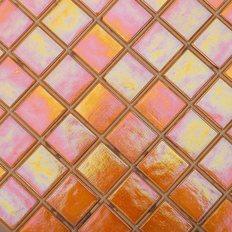 Close-up of orange 20mm iridescent mosaic tiles with vibrant shimmer and fine texture.