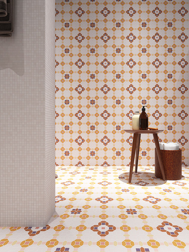 Beige and warm-toned floral pattern mosaic tiles on the bathroom wall and floor.