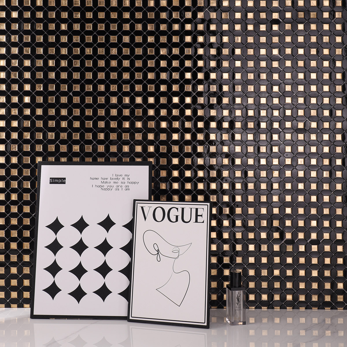 Black mini picket and square gold glass mosaic tiles on the wall.