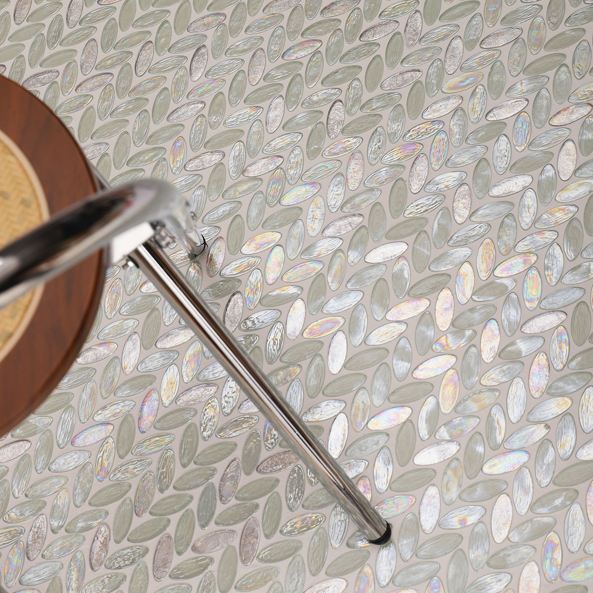Iridescent White Oval Glass Mosaic Tiles on the floor with a stool