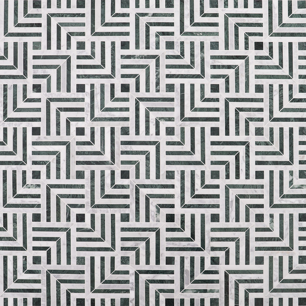 Green and white geometric pattern marble mosaic floor with intricate detailing in the home interior.