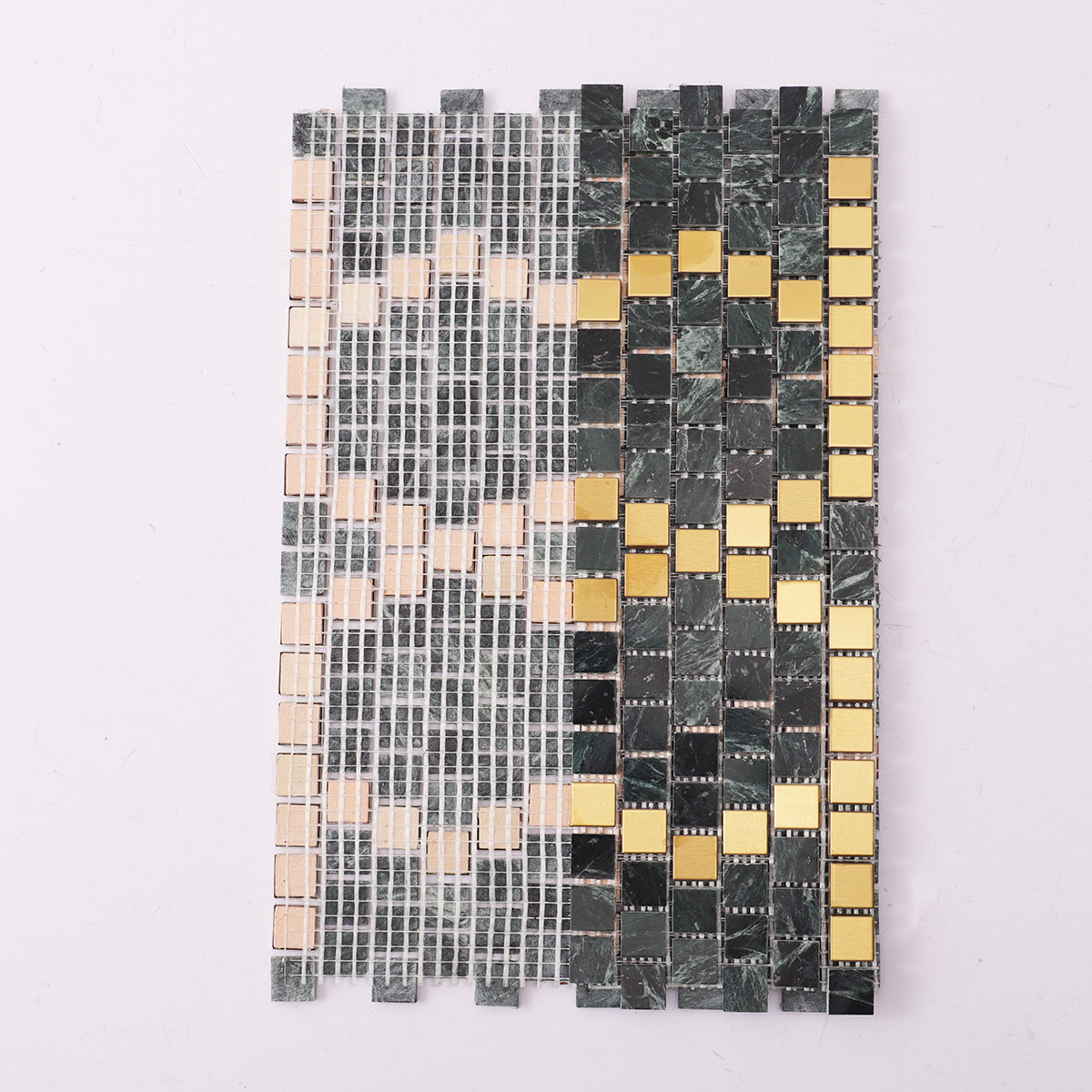 Back side of green marble and metal pixel art mosaic, showing fold