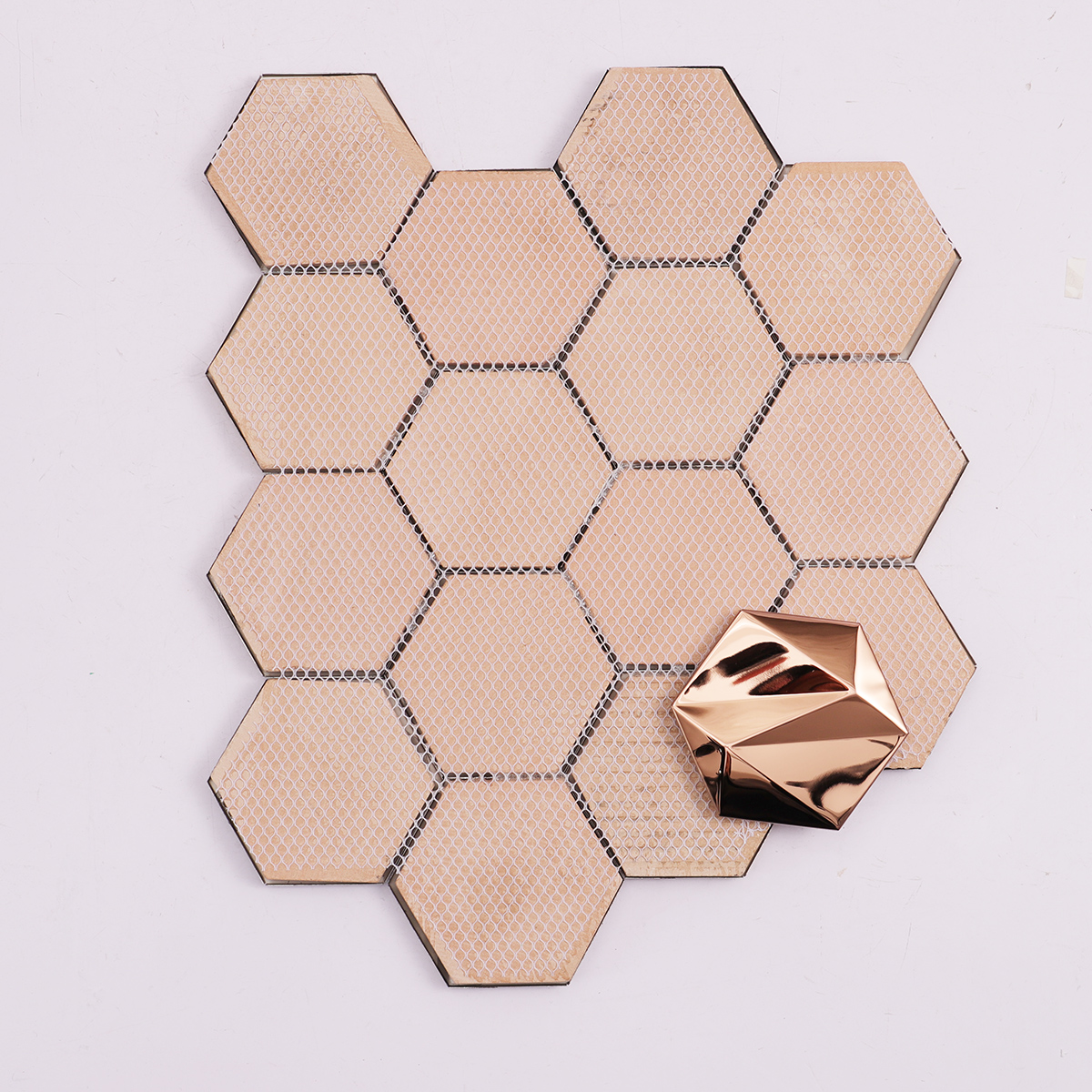 Back side of 3D hexagon metal mosaic tiles, folded
