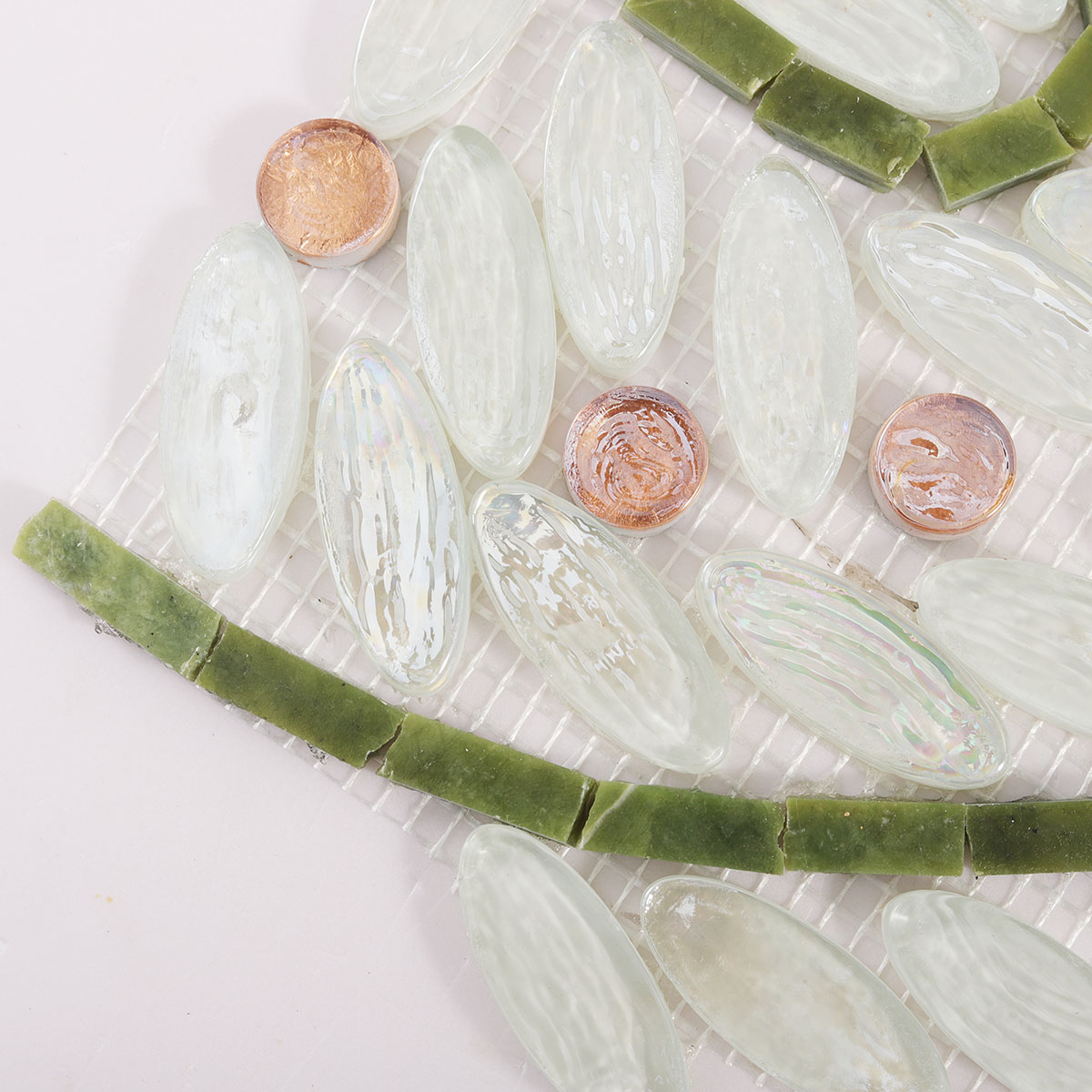 Macro close-up of White Oval Glass Mosaic Art Tiles