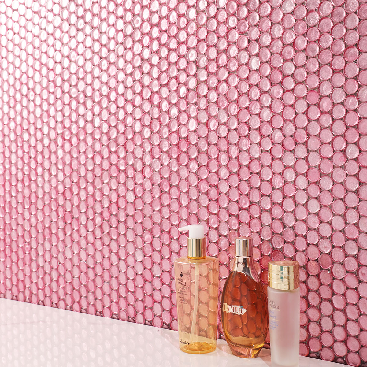 Bathroom Wall Covered in Pink Penny Round Mosaic Tile with White Floor