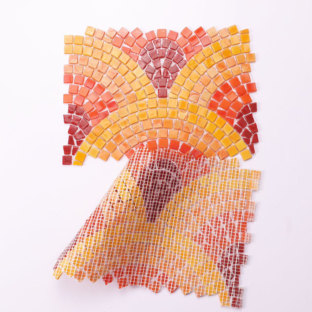 Back side of orange and red glass mural mosaic art