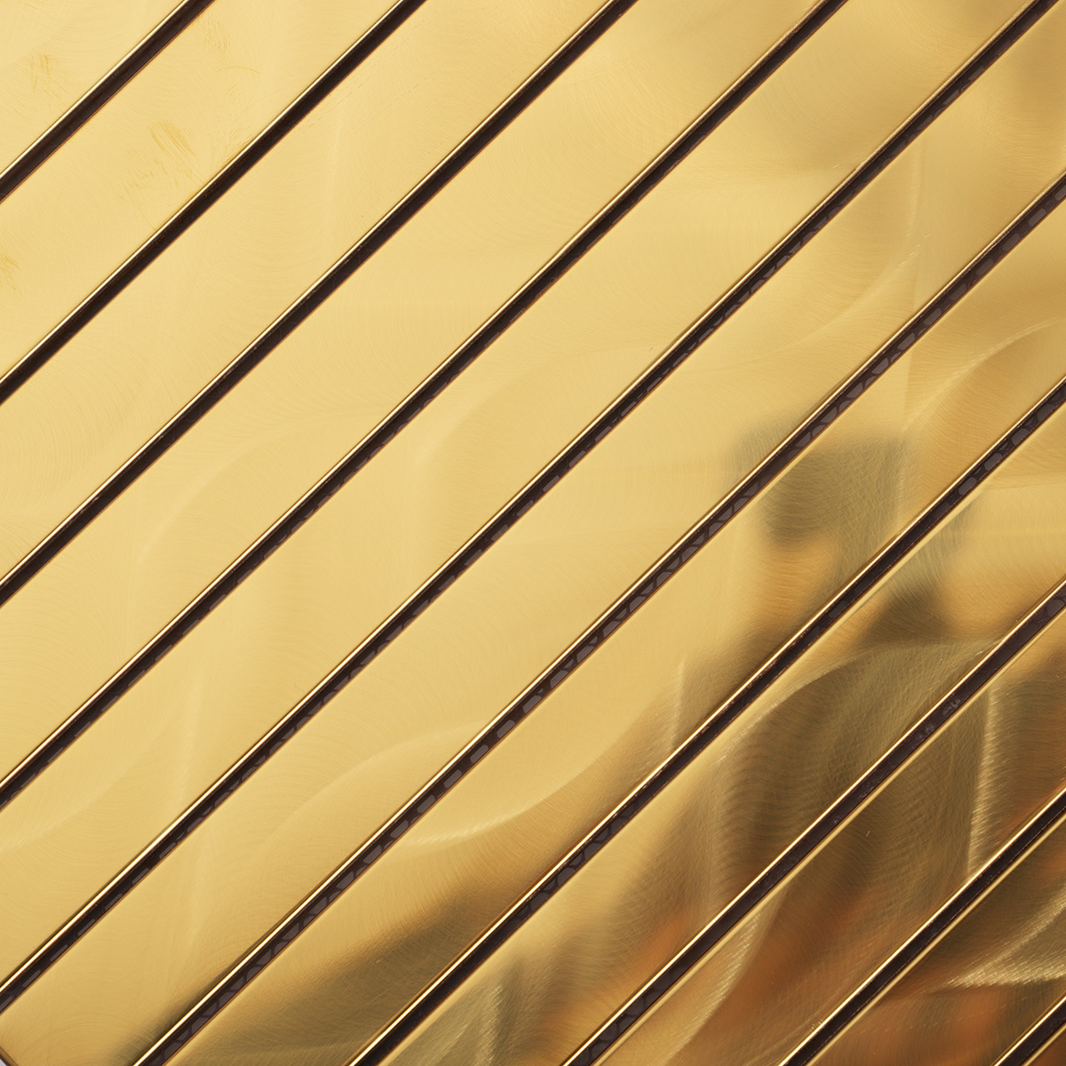 Close-up of gold stainless steel strip brick mosaic wall tiles.