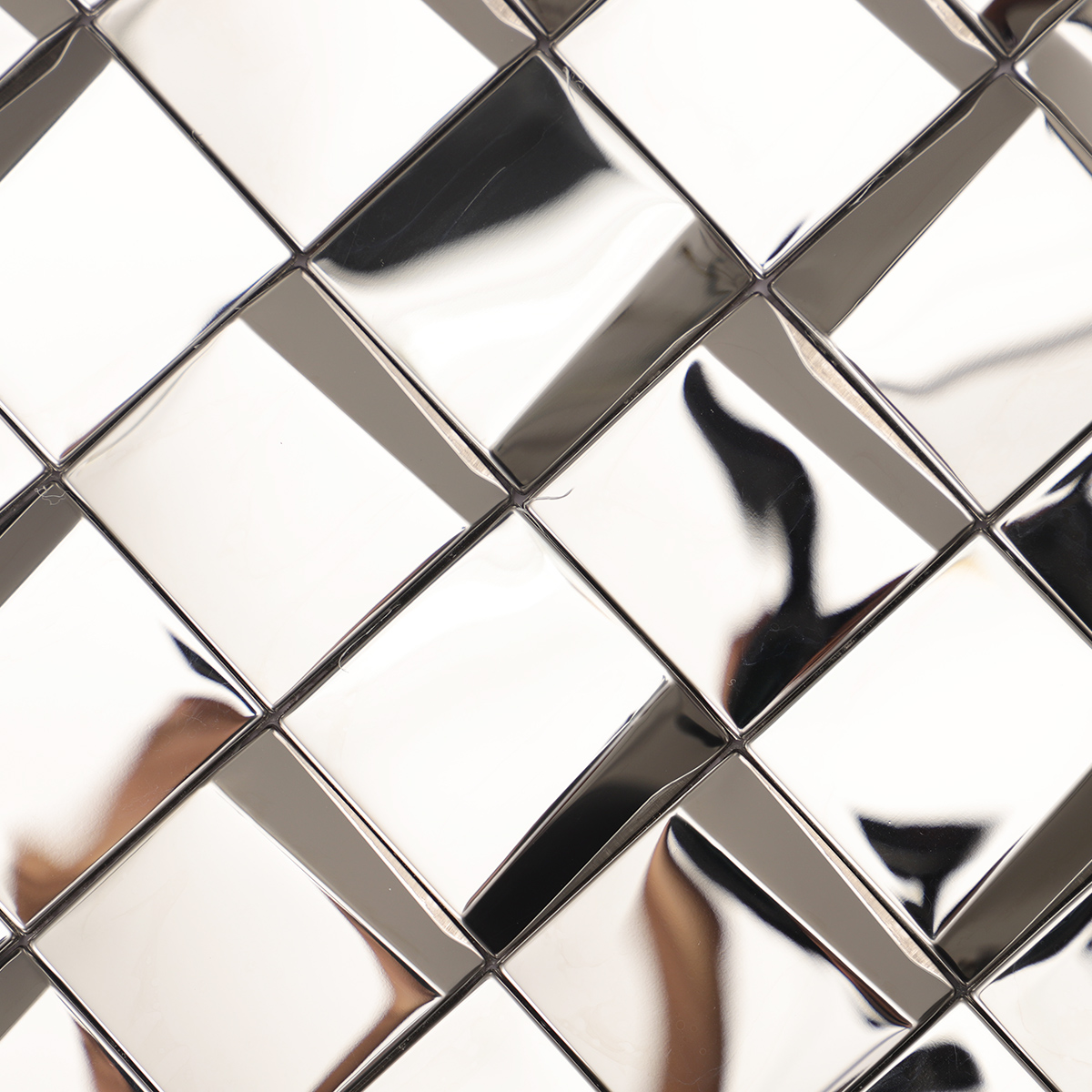 Close-up of silver stainless steel square mosaic wall tiles.