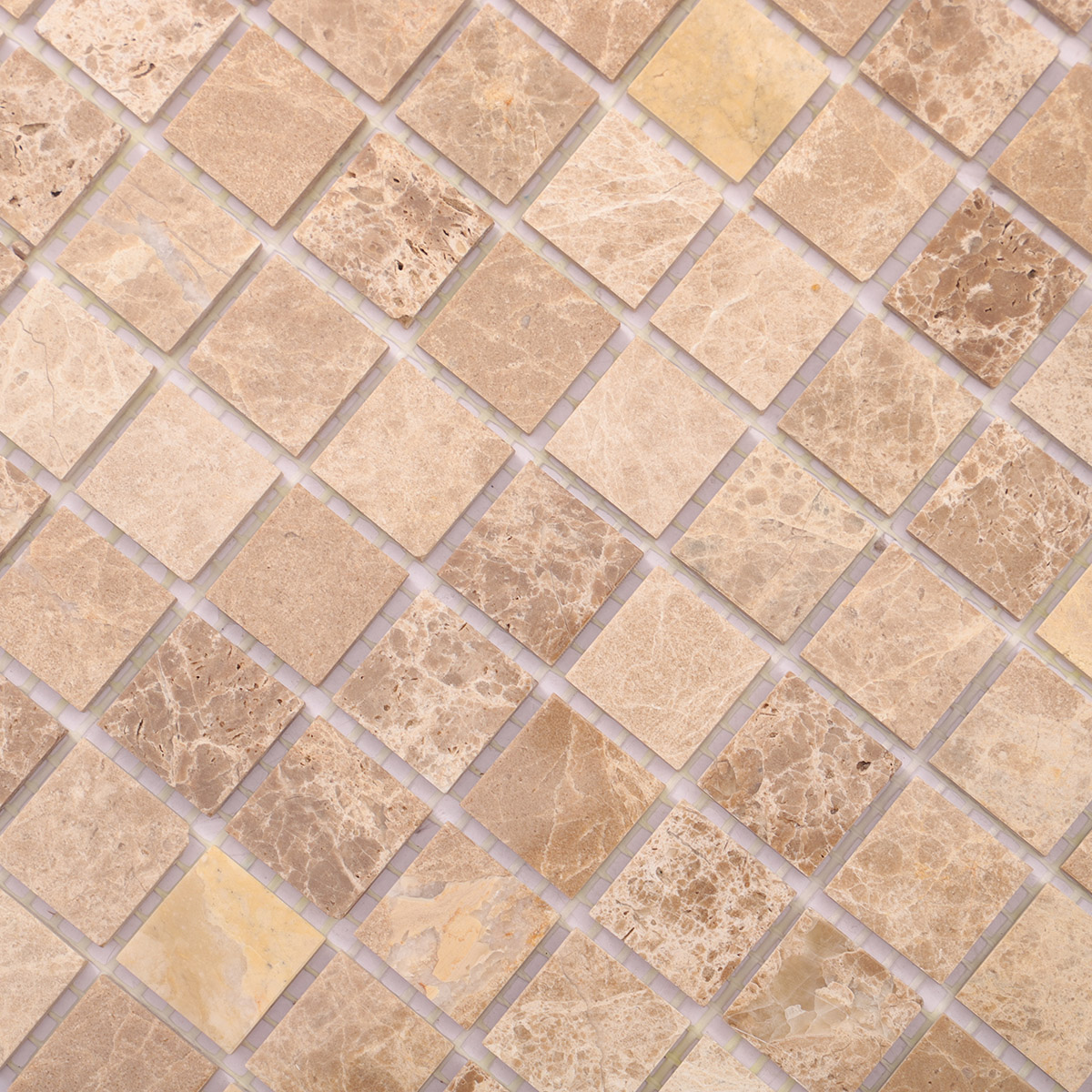 Close-up of Emperador light polished marble mosaic tiles.