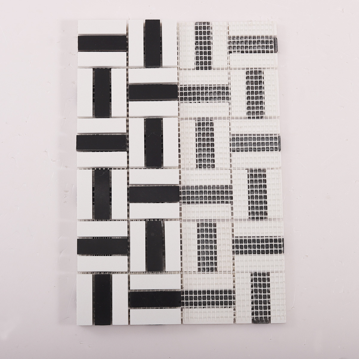 Rear folded view of black and white faux marble mosaic tiles