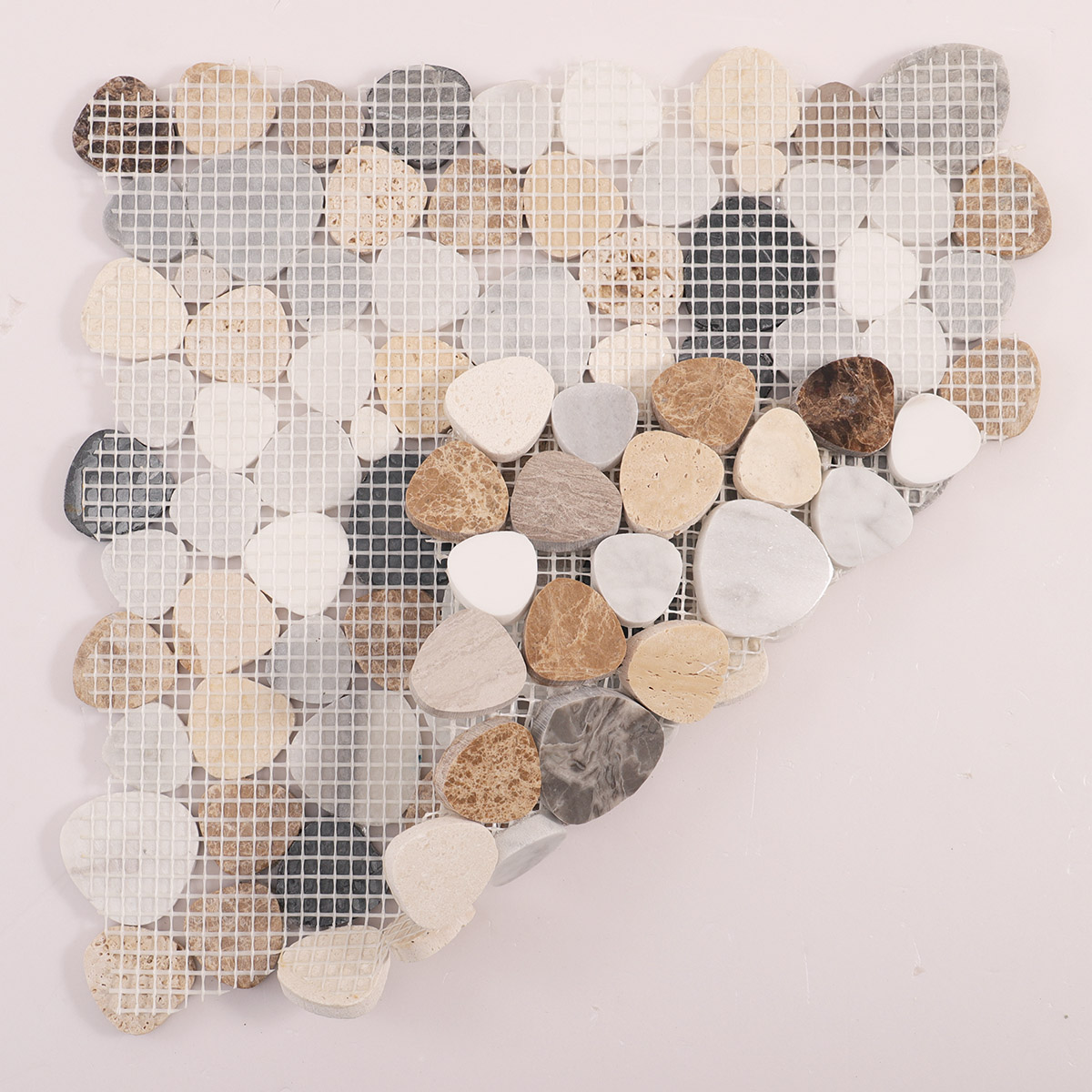 Folded back side of mix pebble marble mosaic tiles