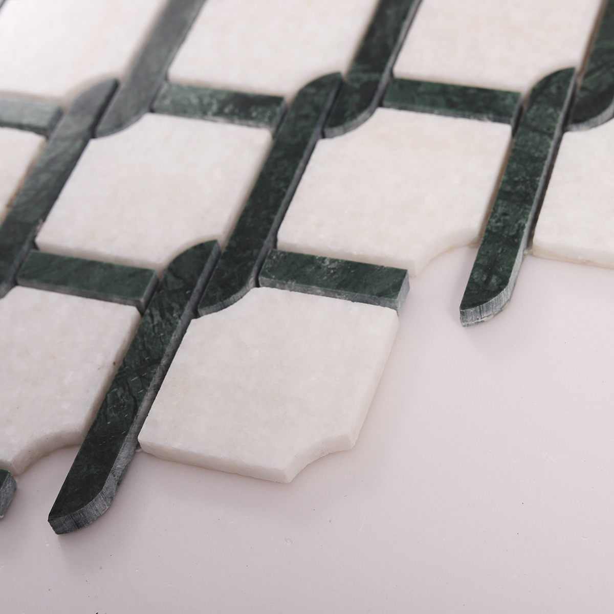 Side close-up view of Thassos Green and White Princess Weave natural stone mosaic tiles