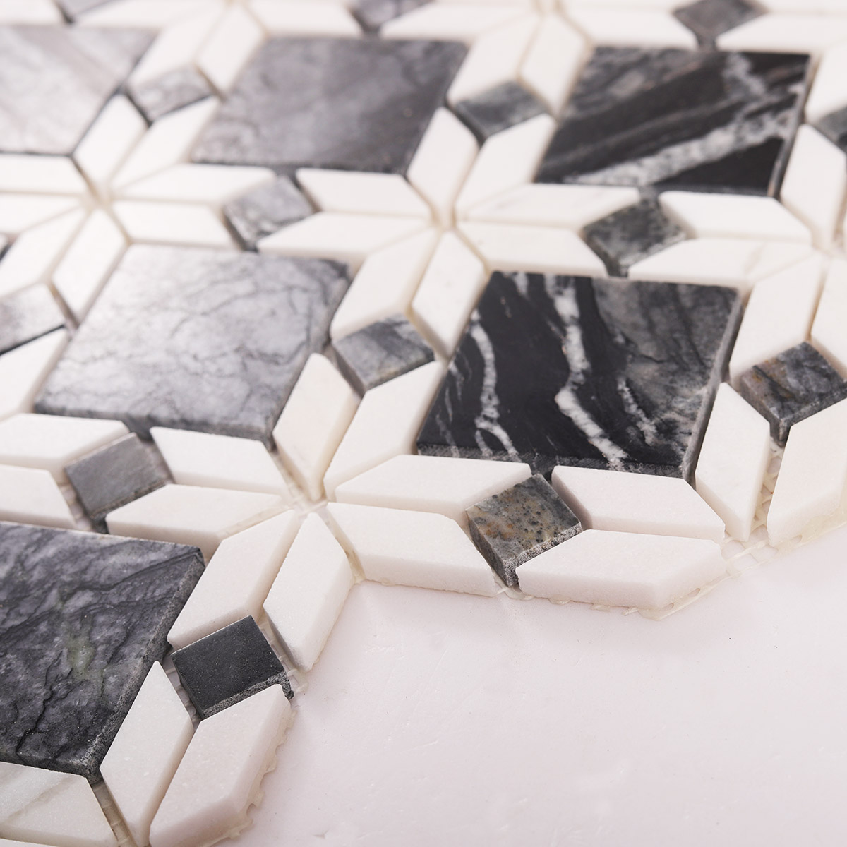 Side close-up view of Floral Pattern Gray and White Marble Mosaic Tiles