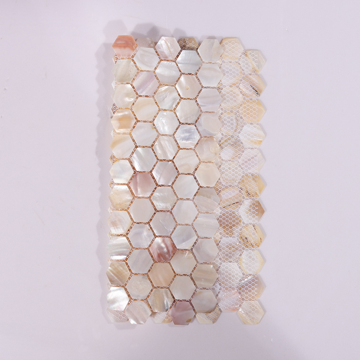 Natural Mother of Pearl Hexagon Mosaic Tiles, back side with fold visible, sturdy design.