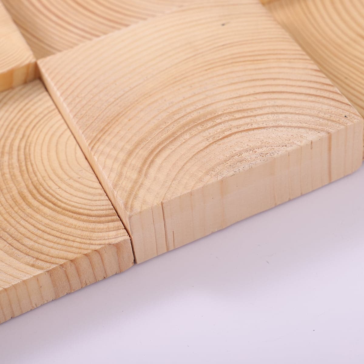  Close-up of beveled wood mosaic tile with smooth finish