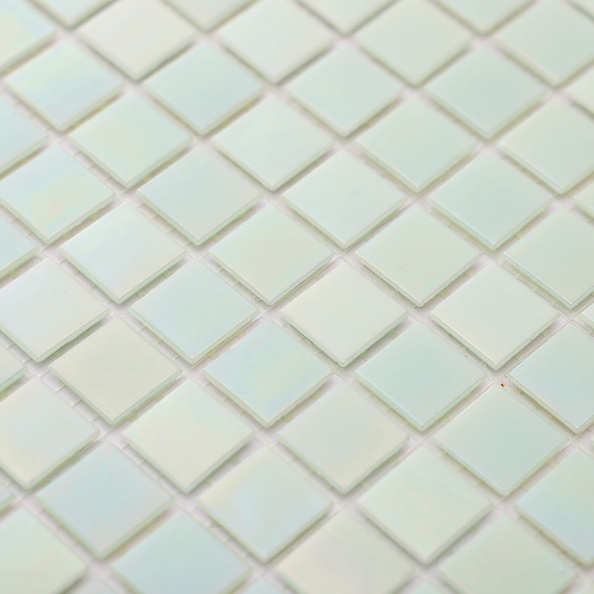 Close-up of green iridescent square glass mosaic tiles